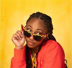 Akira Potts wearing hot dog sunglasses